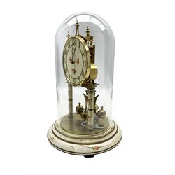 20th century Kundo torsion clock with a four ball rotary pendulum under a glass dome.