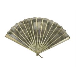 19th century ivory fan, painted with a central reserve of a courting couple, the net leaf embroidered with gold sequins and applied green silk banding, pique work ivory sticks and guards (guard L19cm)