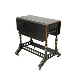 Victorian aesthetic period ebonised and parcel gilt drop leaf table, the rectangular top with canted corners over ring turned supports united by spindle gallery stretchers, raised on splayed supports with castors, W60cm, H63cm