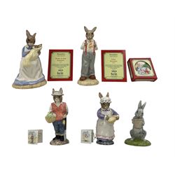 Royal Doulton large Bunnykins Figures, Mother & Baby Bunnykins DB226 no.869 Father Bunnykins DB227 no.869 with certificates, Bunnykins Christmas tree ornament; two Beswick English Country Folk rabbit figures The Gardener Rabbit and Mrs Rabbit Baking and a Royal Doulton The Winnie the Pooh Collection Rabbit Reads the Plan