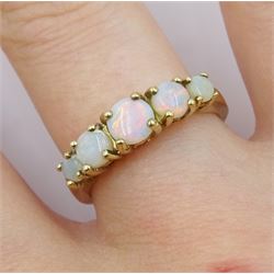 9ct gold five stone opal ring, hallmarked 