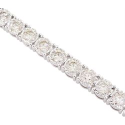 White gold round brilliant cut diamond line bracelet, hallmarked 9ct, total diamond weight 11.03 carat