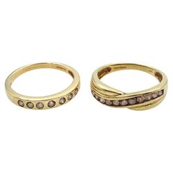 Gold fancy champagne colour diamond crossover ring and one other gold fancy diamond half eternity ring, both hallmarked 9ct