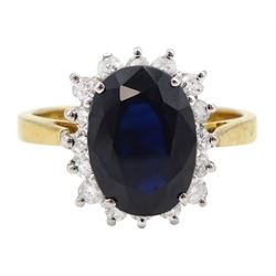 18ct gold oval sapphire and round brilliant cut diamond cluster ring, hallmarked, sapphire approx 3.50 carat, total diamond weight approx 1.30 carat