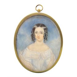 Unsigned 19th century oval half length miniature portrait on ivory of a young lady with ringlets in her hair 9cm x 7cm