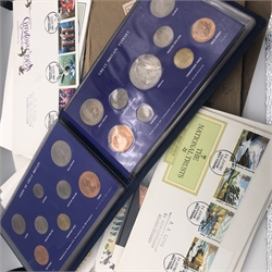 Various Queen Elizabeth II sets/part coin sets in a folder and various First Day covers