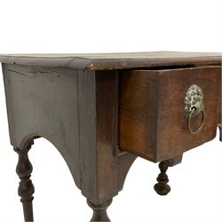 18th century oak lowboy, rectangular top with moulded edge, fitted with three drawers with brass lion mask handle plates and ring handles, shaped apron over turned supports 