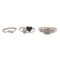 White gold heart design black and white diamond ring, and two diamond set rings, all 9ct hallmarked or tested (3)