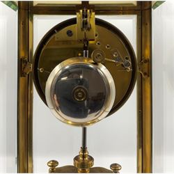 French - late 19th century 8-day four glass clock c 1890, with four rectangular bevel glass panels, two part enamel dial with a visible Brocot deadbeat escapement and jewelled cornelian pallets, Roman numerals, minute markers and steel moon hands, two train rack striking movement with a twin-file mercury filled pendulum, striking the hours and half hours on a bell. 