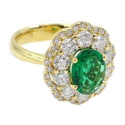 18ct gold oval emerald and diamond cluster ring, stamped 750, emerald approx 1.15 carat, total diamond weight approx 1.20 carat