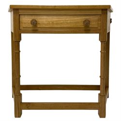 Beaverman - oak side table, canted form and fitted with single drawer, Yorkshire rose carved handles, turned supports joined by plain stretchers, carved with beaver signature, by Colin Almack of Sutton-under-Whitestonecliffe 