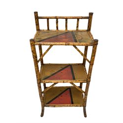 Victorian bamboo lamp table, the top with lacquer panel raised on four splayed supports united by under tier, together with a similar etagere  