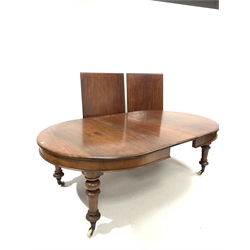 Large Victorian extending dining table, with 'D' ends, wind out mechanism, three additional leaves, raised on turned supports, terminating in ceramic castors, 360cm x 135cm, H75cm