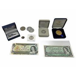 Coins, Banknotes and other collectors items, including Edward I hammered penny, The Royal Mint 'The Royal Birth 2018 UK Silver Penny', cased with certificate, Vatican City 500 Lire coin,  Canadian one dollar banknote Ottawa 1954  and one dollar banknote Ottawa 1973, Concorde 'Last Flight of Concorde' medallion, in blue case etc