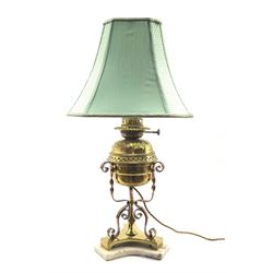 Arts and Crafts style copper and brass oil lamp base, having spiral twist supports on trifom base and marble plinth, with matched brass reservoir, converted to electric, H29cm (excluding reservoir)