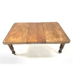Victorian mahogany extending dining table, rectangular moulded top raised on turned lobe carved supports with brass cup castors, two additional leaves 
