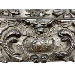 Pair of 17th Century oak panels carved with putti and foliage, each bearing 17th Century dates 13cm x 44cm