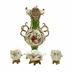 19th century Coalbrookdale style porcelain vase and stand painted with a pair of opposing panels of flowers, with gilt scroll handles H35cm together with a 19th century Moore Brothers three piece 'Cactus' garniture