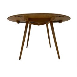 Ercol - mid-20th century elm and beech 'Round Shaped Dining Table', drop leaf top with sliding metal rods, over splayed tapering supports