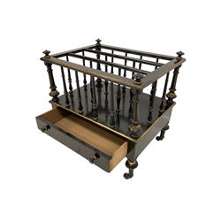 Victorian ebonised and parcel-gilt three division Canterbury or magazine rack, finials to each corner, turned spindle uprights, single drawer to base, turned feet terminating in brass and ceramic castors