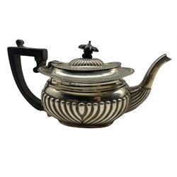 Late Victorian silver teapot with gadrooned edge, ebonised handle and lift Chester 1899 Maker Minshull and Latimer 12.1oz gross
