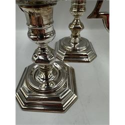 Pair of silver three branch table candelabra with scroll branches and on octagonal bases H21cm Birmingham 1964 Maker Adie Bros. 