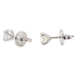 Pair of 18ct white gold round brilliant cut diamond stud earrings, hallmarked, total diamond weight approx 1.05 carat