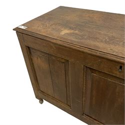 18th Century oak coffer or chest, rectangular hinged top with moulded edge, triple panelled front, on castors