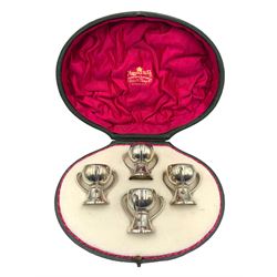 Set of four Edwardian silver three handled tot cups, H4.5cm, in a Mappin & Webb case London 1907 Maker Wakeley & Wheeler 4.2oz