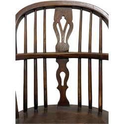 19th century elm and oak Windsor chair, low hoop stick back with pierced splat, dished seat raised on ring turned supports joined by crinoline stretcher