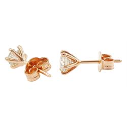 Pair of 18ct rose gold round brilliant cut diamond stud earrings, total diamond weight 0.96 carat, with World Gemological Institute report