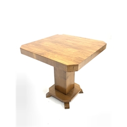Early 20th century Art Deco walnut lamp table, square top with canted corners raised on square section pedestal and platform base with four splayed feet, 