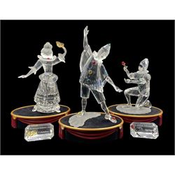 Three Swarovski crystal SCS Annual Edition 'Masquerade' figures designed by Gabriele Stamey, comprising Pierrot - 1999, Columbine - 2000, and Harlequin - 2001, two with plaques and all with stands, all boxed