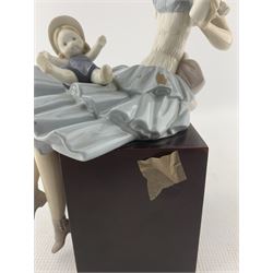 Lladro figure 'Cathy and her Doll' on mahogany base No.1380 withdrawn 1985 H28cm