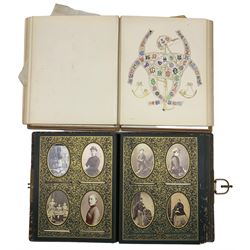 Victorian stamped leather photograph album and contents of portrait photographs and with metal clasp and 'Armorial Album' published by Marcus Ward, London (2)