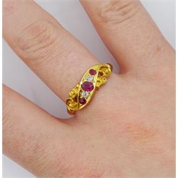 Edwardian 18ct gold five stone ruby and diamond ring, in navette and pierced scroll design setting, Birmingham 1904, in box by Smith & Son, Scarborough