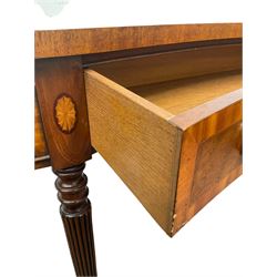 Burr walnut serpentine hall table, the serpentine top with satinwood string inlay over one frieze drawer, raised on turned and reeded supports 