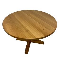 Knightman - oak dining table, circular top on cruciform base with sledge feet, carved with knight signaure, by Horace Knight, Balk, Thirsk 
