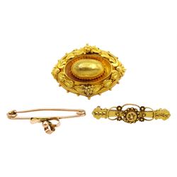 Victorian gold oval mourning brooch, 15ct gold bar brooch and a 9ct gold bow bar brooch