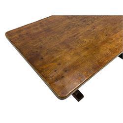 Mouseman - circa. 1940s adzed oak refectory dining table, rectangular pegged plank top, shaped solid end supports on sledge feet joined by floor stretcher, carved with mouse signature, by Robert Thompson of Kilburn