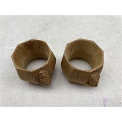 Pair of 'Mouseman' oak napkin rings with carved mouse signature, by Robert Thompson of Kilburn, H5cm (2)