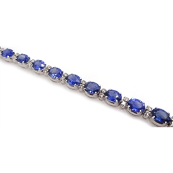 18ct white gold oval sapphire and round brilliant cut diamond bracelet, stamped 750, total sapphire weight approx 12.00 carat
