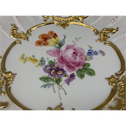 20th century Meissen relief decorated plate, centrally hand painted with floral sprays, with a gilt raised border reserving painted floral panels, impressed no. 152 D30cm