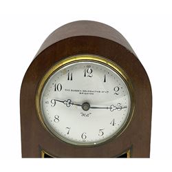 A 1920’s mahogany cased timepiece mantle clock, white enamel dial, upright Arabic numerals and quarter hours with minute markers ,matching steel trefoil hands, inscribed “The Sussex Goldsmiths Co Ltd Brighton”, convex glass with a spun brass bezel, spring driven rear wound and set movement with a platform escapement, plinth with brass bun feet and Gadroon moulding, case with an arched top and recessed mahogany panel to the front,  brass slip and hinged brass rear case door.
With key.
Height 28 cm
The Sussex Goldsmith's were established in 1850 trading as The Sussex Goldsmiths Co Ltd Brighton from 1920-1951
