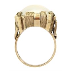 9ct gold mabe pearl ring, in a textured claw setting, hallmarked