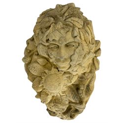 Cast stone wall plaque or mask in the form of a feminised Green Man, covered with oak leaves and acorns (35cm x 25cm); rectangular wall plaque with Green Man lozenge (39cm x 27cm); and another Green Man wall plaque (36cm x 34cm) (3)