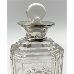  Glass globe scent bottle with silver cover Birmingham 1910, two others with silver covers , another with silver collar London 1923 and a glass salts bottle with silver cover 
