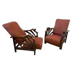 Pair of Art Deco period beech framed reclining armchairs, the sprung back and seat upholstered in red fabric, shaped arm supports with fan slats and globular terminals