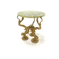 Brass and onyx circular table, cast base in the form of three mythical fish 