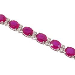 18ct white gold oval ruby and round brilliant cut diamond bracelet, stamped, total ruby weight approx 9.85 carat